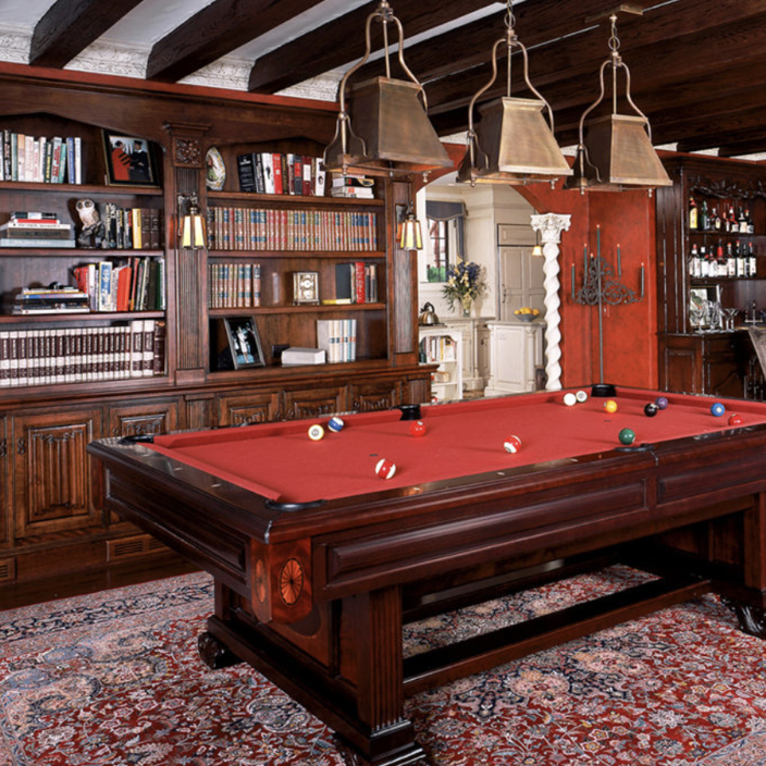 Family room with pool table and book shelves