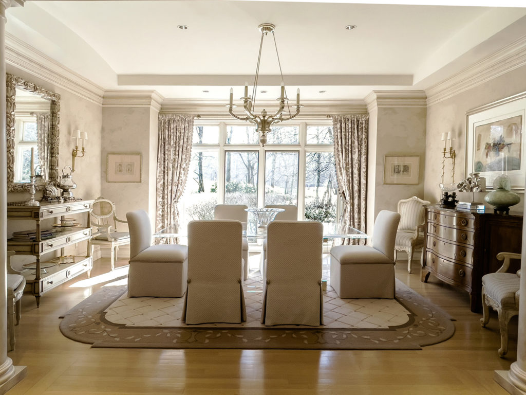 Elegant dining room with custom area rug